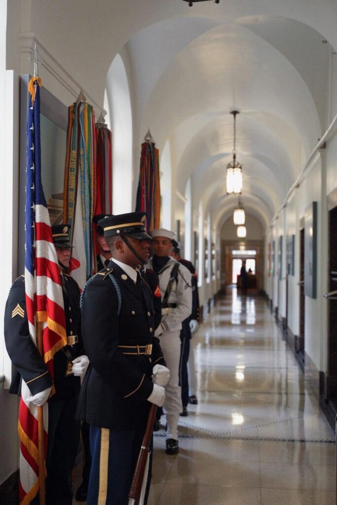 Color guards standing outside the President’s “E” Award Ceremony